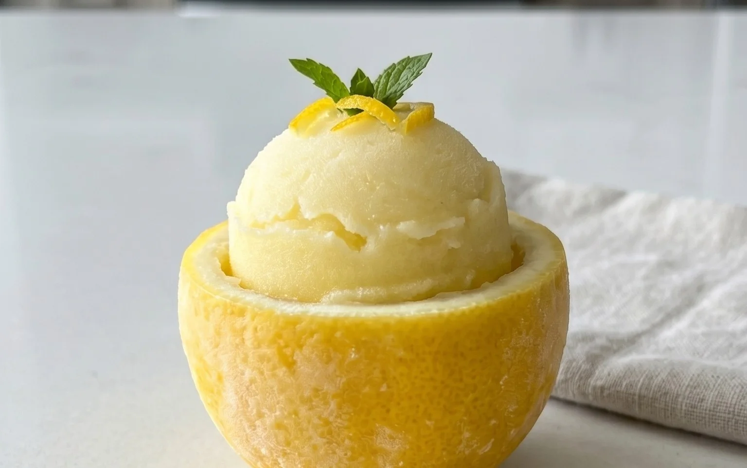 Sorbetto di Limone Dressed Up in a Frozen Lemon Shell